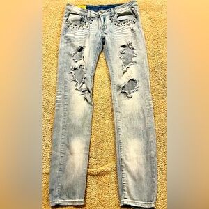 Machine Distressed/Ripped Jeans